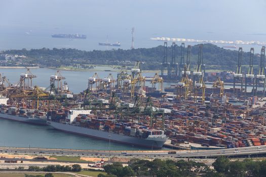 Landscape from bird view of Cargo ships entering one of the busiest ports in the world, Singapore