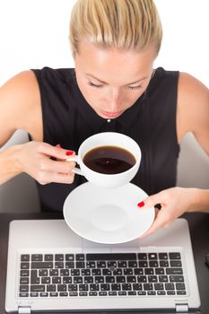 Business woman holding white cup of coffee in her hands. Coffee break.