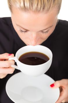 Business woman holding white cup of coffee in her hands. Coffee break.