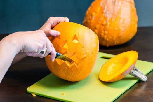 Halloween pumpkins Jack O'Lantern being carved for Halloween