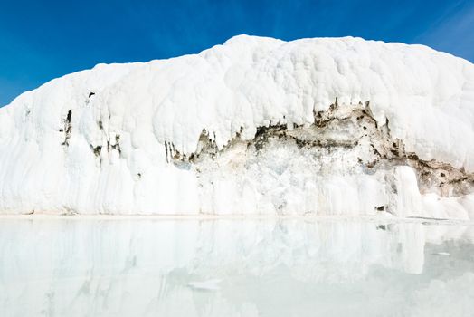 Travertine pool as part of the natural phenomenon in Pamukkale, Turkey