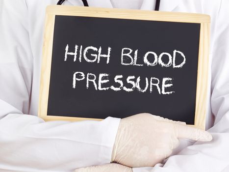 Doctor shows information: high blood pressure