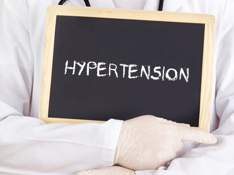 Doctor shows information: hypertension