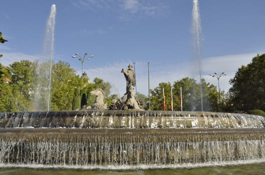 The Fountain of Neptune is a neoclassical monument that is at the center of the Plaza de Canovas del Castillo, in the Spanish city of Madrid.