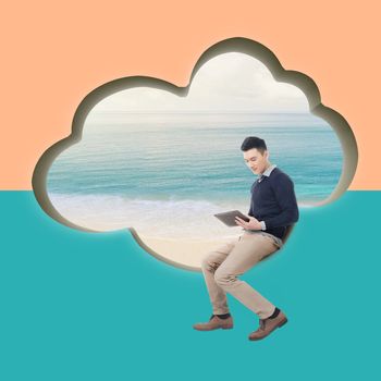 Cloud concept with man sit at a cloud shaped wall and using tablet.