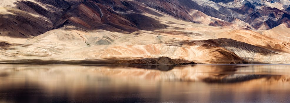 Tsomoriri mountain lake with fantastic mountains background and reflections in the lake (north India)