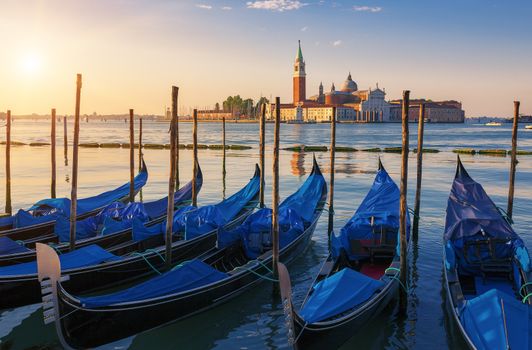 Beautiful view of Venice with gondolas at sunrise, Italy
