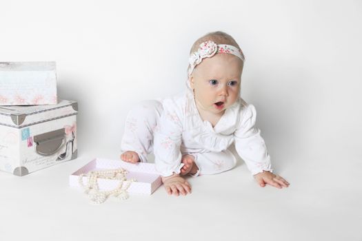 Beautiful small kid girl in studio