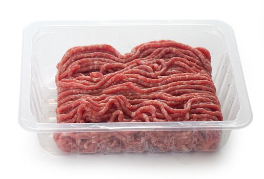 Fresh minced meat in the transparent plastic box