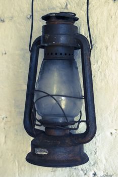 An old rusty kerosene lamp in a museum