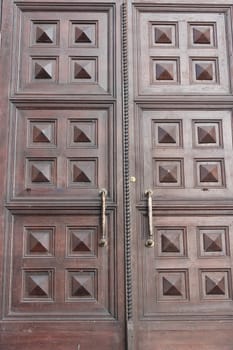 massive church doors with old nice pattern