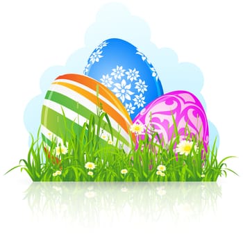 Three Easter eggs in the green grass isolated on white background