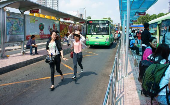 HO CHI MINH, VIET NAM: Passenger bus transport people in city, stop at Ben Thanh bus station, this public service center is place regulate activity for transportation by buses, Vietnam, April 16, 2014