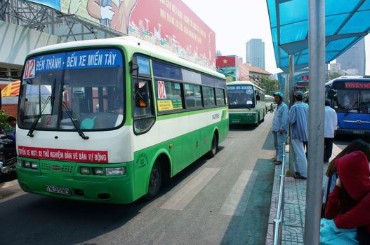 HO CHI MINH, VIET NAM: Passenger bus transport people in city, stop at Ben Thanh bus station, this public service center is place regulate activity for transportation by buses, Vietnam, April 16, 2014