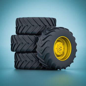 Tractor wheels isolated on blue background