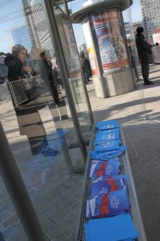 Moscow, Russia - March 10, 2012. An independent report by Boris Nemtsov Putin Results laid out at the bus stop next to the opposition rally