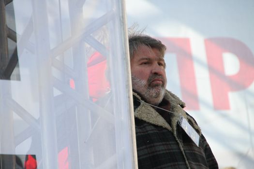 Moscow, Russia - March 10, 2012. Journalist Alexander Ryklin on an opposition rally on election results