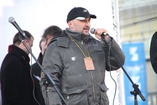 Moscow, Russia - March 10, 2012. Civil activist Vadim Korovin on an opposition rally on election results