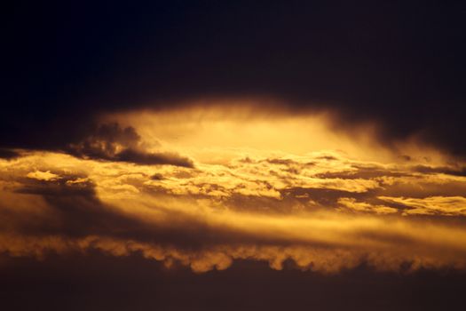  one golden morning with the golden rays of sun reflected by the clouds 