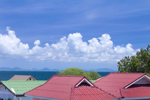 Beautiful blue sky with clouds and Beautiful house roof.