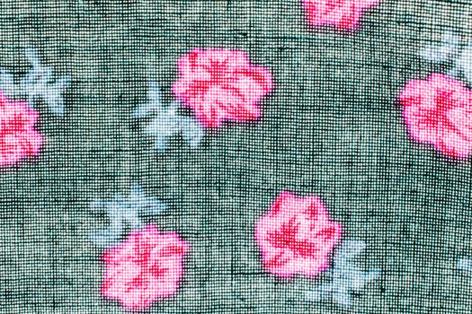 texture,print and wale of fabric  black and pink flowers in beautiful floral pattern close-up