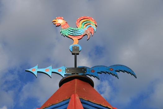 Wooden painted vane, the figure of a rooster and the wind direction indicator, Russia