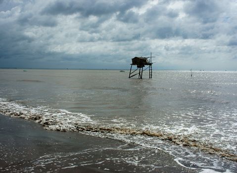 bamboo, watch, watch tower, wooden, house, box, sea, ocean, tower, guard, watchtower, wood, safety, outdoors, sky, lookout, life, security, help, protect, safe, stairs, safeguard, beach, landscape, tourism, cloud, vietnam, viet nam, mekong delta, asia, asian, travel, water, black sand, colors, day, flag, square, horizontal, black, wave, clouds, cloudy, weather, dark clouds, bad