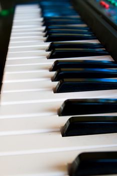 the black and white keys of a piano