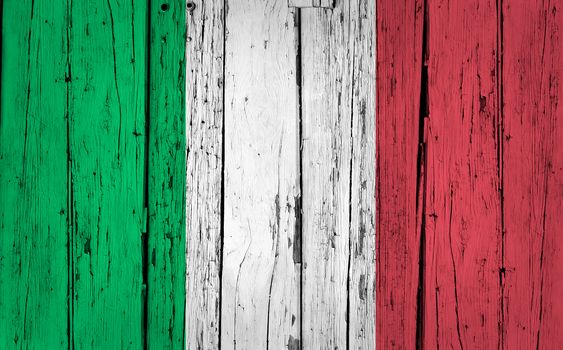 Italy grunge wood background with Italian flag painted on aged wooden wall.