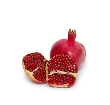 Ripe pomegranate fruit isolated on white background cutout