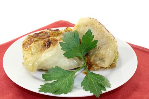 a plate of cabbage roll and parsley