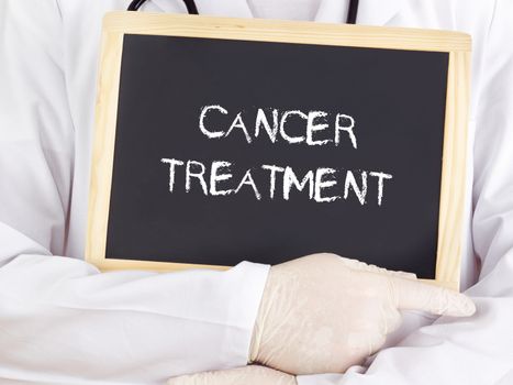 Doctor shows information: cancer treatment