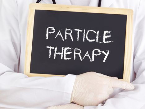 Doctor shows information: particle therapy