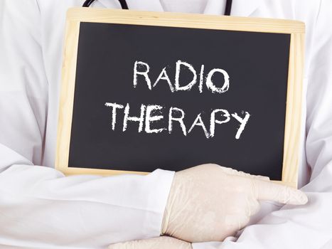 Doctor shows information: radiotherapy