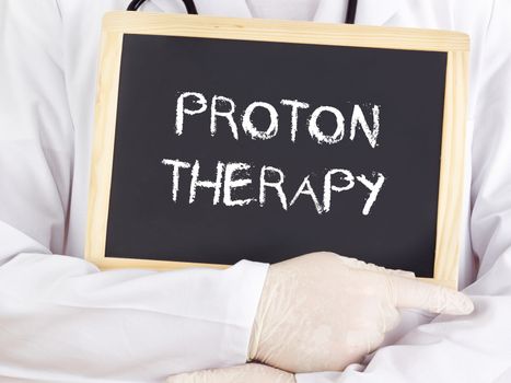 Doctor shows information: proton therapy