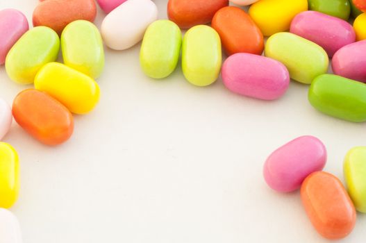 beautiful background of colored and various candy or pills