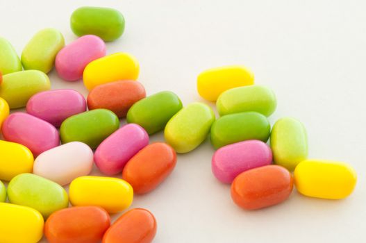 beautiful background of colored and various candy or pills