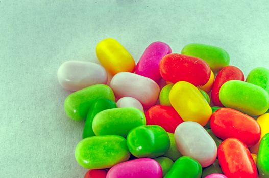 beautiful background of colored and various candy or pills