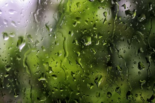Texture of window glass pane during storm