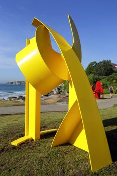 BONDI, AUSTRALIA - OCTOBER 23, 2014; Sculpture by the Sea Annual free public event 2014.  Exhibit titled Clutch  by artist Noah Birch,  WA.  An improvised abstract composition made of painted steel.