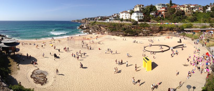 BONDI, AUSTRALIA -  NOVEMBER 9, 2014; Sculpture by the Sea free public event 2014.  Overhead view of some of the sculptures on Tamarama Beach, during the annual Sculptures by the Sea festival.