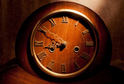 Closeup of an aged grandfather clock 
