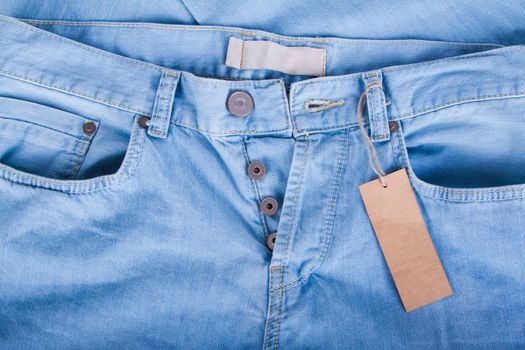 Blue jeans detail with blank label - Stock Images