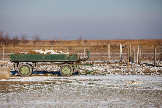 Farm in winter with cart