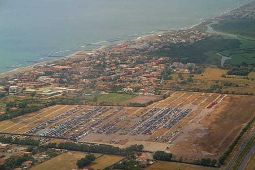 Photo shows Italian landscape taken from the plane.