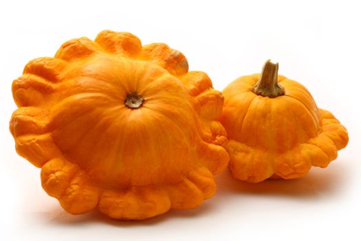 Yellow gourds on white background
