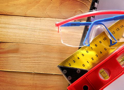 Angle ruler, balance level and goggles