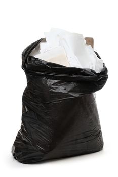 Full black plastic bag on white