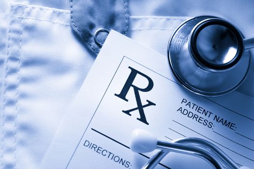 Stethoscope and patient list on doctor's smock