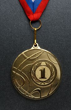 Metal medal with tricolor ribbon